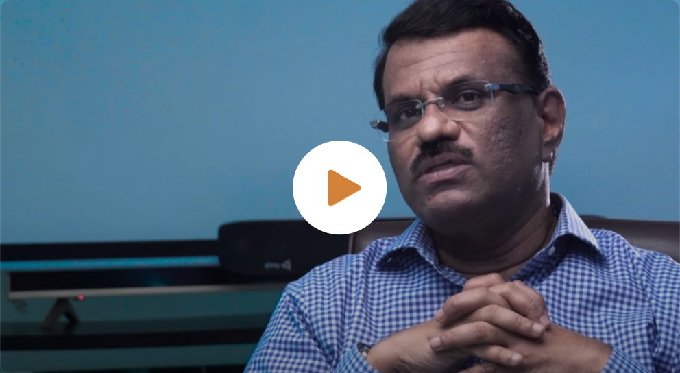 BeatRoute: Man in glasses discusses goal-driven sales.